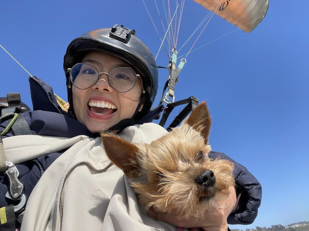 Dog paragliding tandem flight