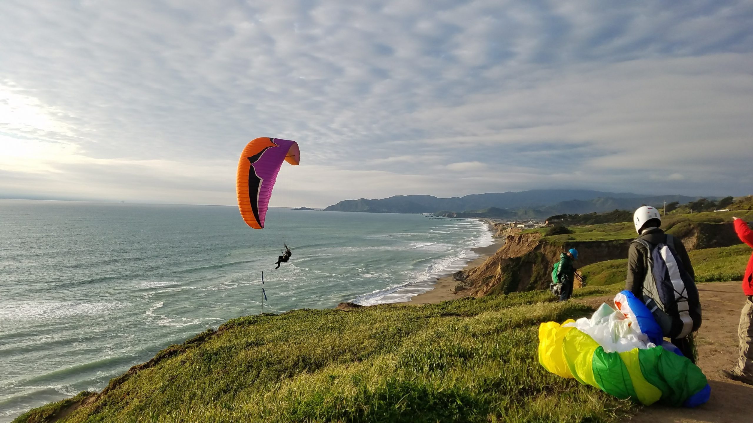 Paragliding above Pacifica cliffs