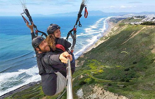 Tandem paragliding over San Francisco coastline